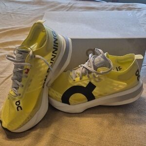 On Running Yellow Athletic Shoes
